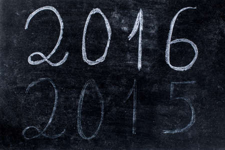2016 written on chalkboard and 2015 almost eraseの写真素材