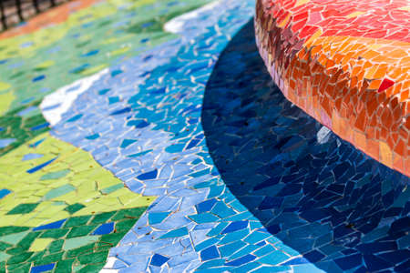 Close-up shot of bright background composed of colorful mosaic piecesの写真素材