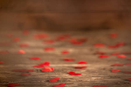 Valentine's day for greeting card with small red heart shape on woodenの写真素材