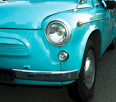 Headlight blue retro car close up viewの写真素材