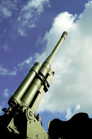 Military weapons antiaircraft gun against the skyの写真素材
