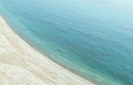 Natural background in the style of minimalism with water and sand view from above