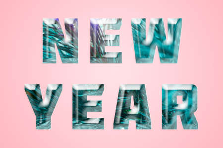 Art ice lettering new year  in minimalism style on pink backdropの写真素材