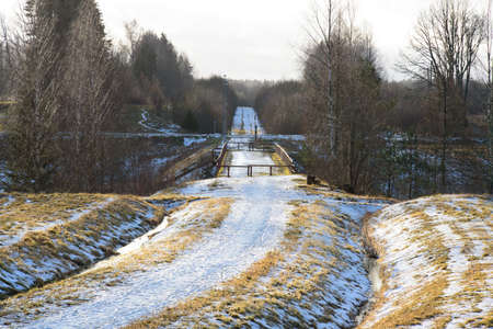 a beautiful footpath where there used to be a small train trackの写真素材