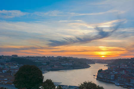 Beautiful sunset over Douro river in Porto, Portugal. HDR photographyの写真素材
