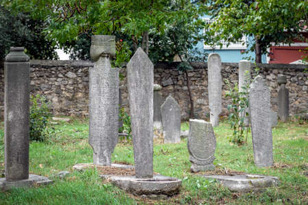 ISTANBUL, TURKEY - September 30, 2015: Gravestones in the old  abandoned cemetery in Kadikoy in Istanbul, Turkey.のeditorial素材