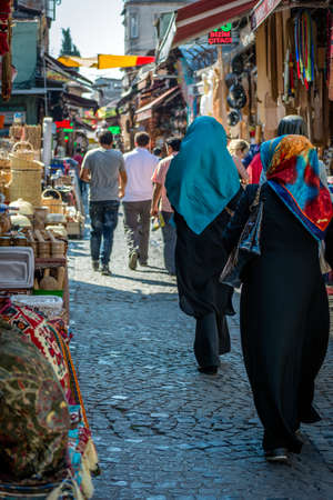 Istanbul, Turkey: July 07, 2015. Muslim ladies are making shopping in the street of Istanbul.のeditorial素材