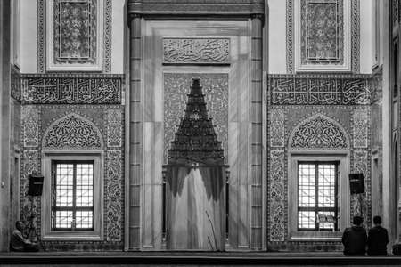 Ankara, Turkey - October 23, 2015: Kocatepe mosque interior in the evening. Preyers in the mosque. Photography in black and whiteのeditorial素材