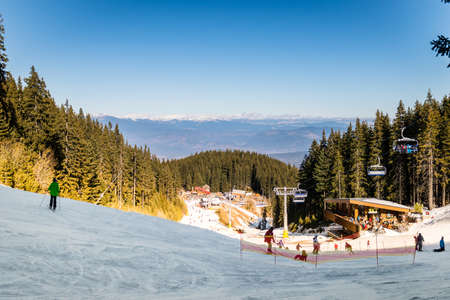 Bansko, Bulgaria - December 29, 2015: People are learning to ski down to the slope in Bansko ski...