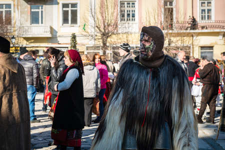 Razlog, Bulgaria - January 01, 2016: Man in the mask came to celebrate the custom festival of "Mummers" "Kukeri" at January in Bulgariaのeditorial素材
