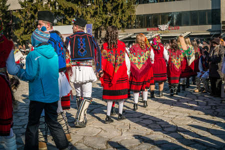 Razlog, Bulgaria - January 01, 2016: People in costumes are taking part in the festival of Mummers in Razlog, Bulgaria. Games, dances and activities are organized for viewers.のeditorial素材