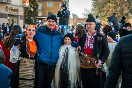 Razlog, Bulgaria - January 01, 2016: People in costumes are taking part in the festival of Mummers in Razlog, Bulgaria. Games, dances and activities are organized for viewers.のeditorial素材