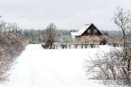 Winter landscape. House in Latvia.の写真素材