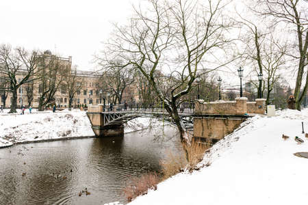 Riga, Latvia - February 20, 2016: People are walking in the park in Riga downtown, Latviaのeditorial素材