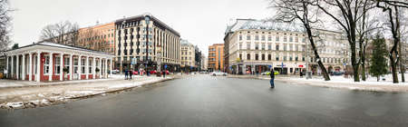 Riga, Latvia - February 20, 2016: People are walking near the Laima clock in downtown Riga. The clock is one of the citys symbols, and a popular meeting place for residents.のeditorial素材