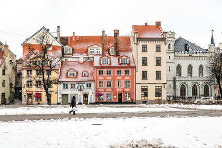 Riga, Latvia - February 20, 2016: People are walking in downtown of Riga on Livu square in Latvia.のeditorial素材