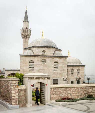 Istanbul, Turkey - March 24, 2016: Man is entering in Semsi Ahmet Pasa mosque in Uskudar, Istanbul, Turkeyのeditorial素材