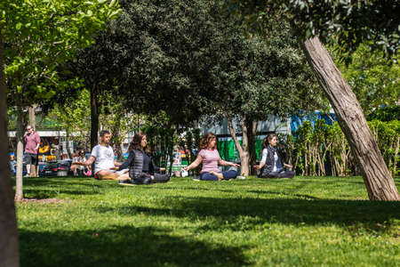Istanbul, Turkey - April 17, 2016: Turkish peopel meditates in the Bebek park in Istanbul, Turkeyのeditorial素材