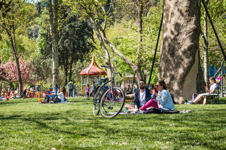 Istanbul, Turkey - April 17, 2016: Couple is having picnic in the Bebek park in Istanbul, Turkeyのeditorial素材