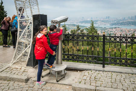 Istanbul, Turkey - April 23, 2016: People are enjoying view on the top of the Camlica hill in...