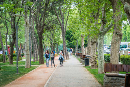Istanbul, Turkey - April 23, 2016: Young girls are walking in the Yogurtcu park in Istanbul, Turkeyのeditorial素材