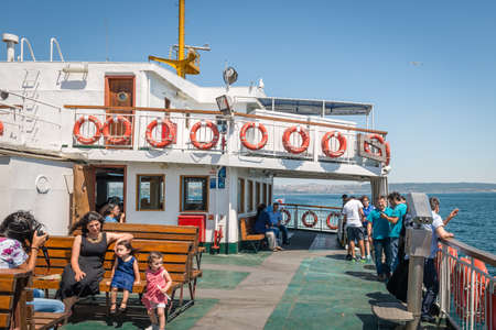 Yalova, Turkey - July 23, 2016: Locals turkish travelers are crossing the sea of Marmara on ferryboat in Turkeyのeditorial素材