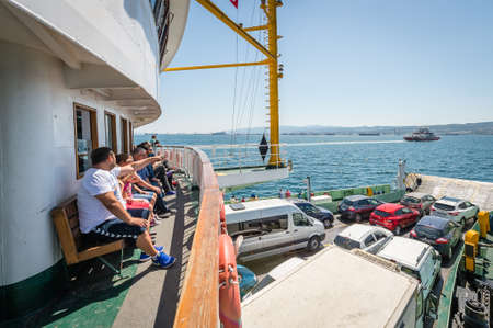 Yalova, Turkey - July 23, 2016: Locals turkish travelers are crossing the sea of Marmara on ferryboat in Turkeyのeditorial素材