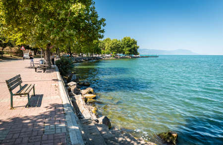 Iznik, Turkey - July 24, 2016: People are resting near the Lake of Iznik in Turkeyのeditorial素材