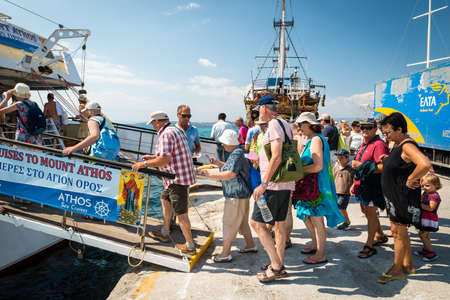Ouranoupoli, Greece - September 13, 2016: People are getting on the  cruise boat on Athos peninsula in Halkidiki, Greeceのeditorial素材