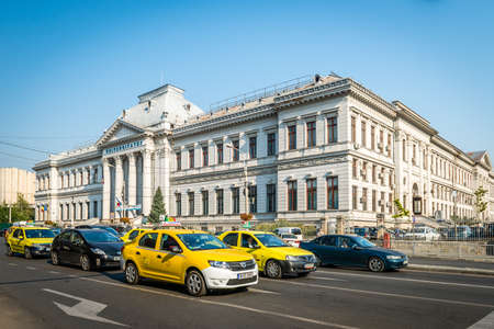 Craiova, Romania - September 16, 2016: People are driving near the University of Craiova in Romaniaのeditorial素材