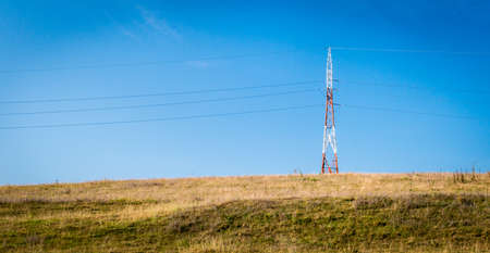 Electricity poles in Romanian countryside. Autumn landscape