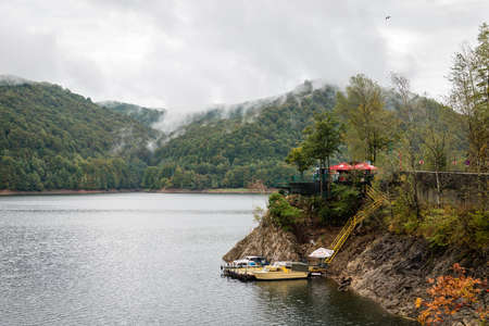 Transylvania, Romania - September 19, 2016: Lake Vidraru created on the dam in Carpathian mountains near Transfagarasan highway in Romaniaのeditorial素材