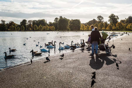 London, United Kingdom - October 17, 2016: People are visiting Kensington Gardens outside of Kensington Palace in London, Englandのeditorial素材