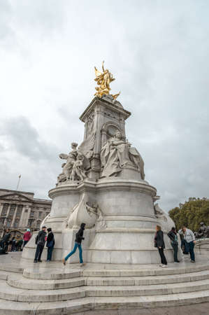 London, United Kingdom - October 18, 2016: People are gethering near Victoria memorial in London, UK before changing of guards near Buckingham Palaceのeditorial素材