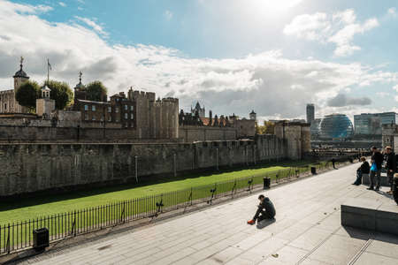 London, United Kingdom - October 20, 2016: People are hanging out in the square near the Tower of London in London, Englandのeditorial素材