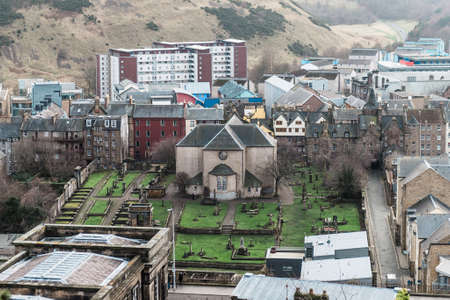 Edinburgh, Scotland - December 30, 2016: The kirkyard viewed from Calton Hill in Edinburgh,...