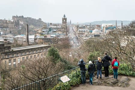 Edinburgh, Scotland - December 30, 2016: People are enjoying cityscape from Calton Hill in...