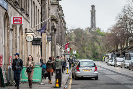 Edinburgh, Scotland - December 30, 2016: People are walking on the streets in Edinburgh, Scotland,...