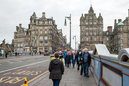 Edinburgh, Scotland - December 30, 2016: People are walking on the North Bridge in Edinburgh, Scotland, UKのeditorial素材