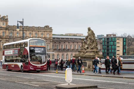 Edinburgh, Scotland - December 30, 2016: People are walking on the North Bridge in Edinburgh, Scotland, UKのeditorial素材