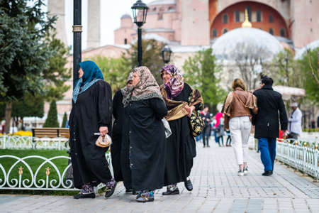 Istanbul, Turkey - April 12, 2017: People are visiting Sultanahmet square near the Blue mosque and...
