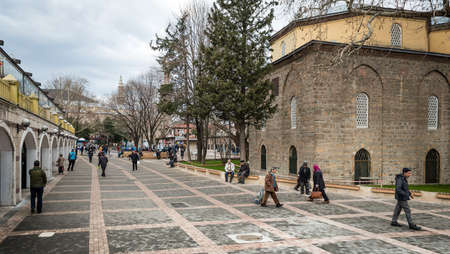 Bursa, Turkey - February 04, 2017: People are walking in the Park near the  Orhan Gazi Mosque (Orhan Camii) in Bursa, Turkeyのeditorial素材