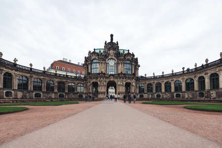 Dresden, Germany- September 16, 2017: Tourists are visiting Zwinger. The Baroque style palace served as an orangery, exhibition gallery and festival arena of the Dresden Court.のeditorial素材