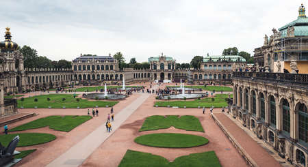 Dresden, Germany- September 16, 2017: Tourists are visiting Zwinger. The Baroque style palace served as an orangery, exhibition gallery and festival arena of the Dresden Court.のeditorial素材