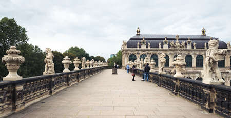 Dresden, Germany- September 16, 2017: Tourists are visiting Zwinger. The Baroque style palace served as an orangery, exhibition gallery and festival arena of the Dresden Court.のeditorial素材