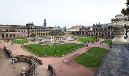 Dresden, Germany- September 16, 2017: Tourists are visiting Zwinger. The Baroque style palace served as an orangery, exhibition gallery and festival arena of the Dresden Court.のeditorial素材