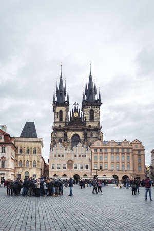 Prague, Czech Republic- November 12, 2017: Tourists are visiting Prague Old Town Square in a winter, Czech Republicのeditorial素材