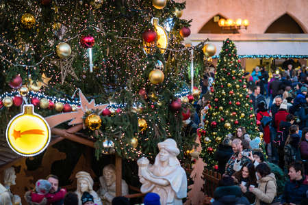 Prague, Czech Republic- December 23, 2017: Crowd near the ChrÄ±stmas tree in Prague Old Town Square where Christmas markets are located.のeditorial素材