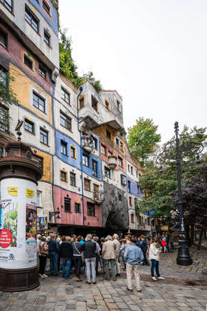 Vienna, Austria- September 02, 2018: People are vÄ±sÄ±tÄ±ng the Hundertwasserhaus in Vienna whÄ±ch is a building designed by the artist Friedensreich Hundertwasser in Austriaのeditorial素材