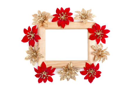 Wooden frame decorated with red and golden flowers isolated on whiteの写真素材